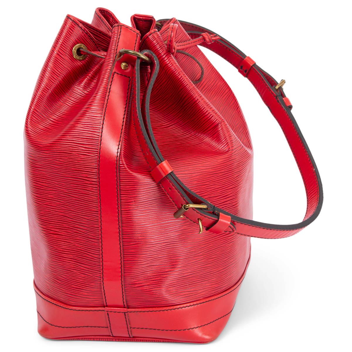 100% authentic Louis Vuitton Noé GM in red Epi leather. Closes with a drawstring on top and and is lined in black microfibre with one zipper pocket against the back. Comes with an adjustable shoulder-strap. Logo embossed at front and features