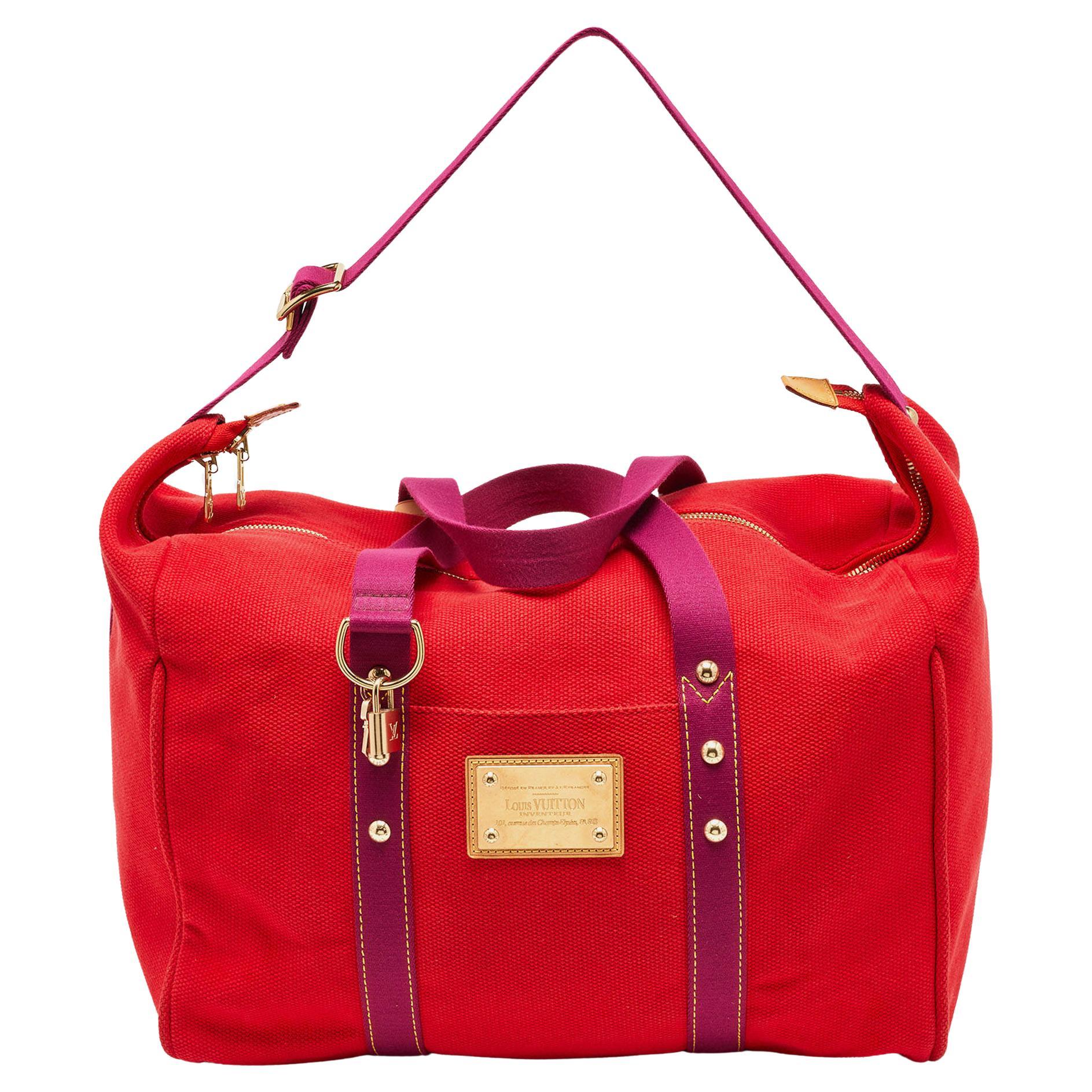Louis Vuitton Rouge Toile Canvas Antigua Sac Weekend Bag en vente