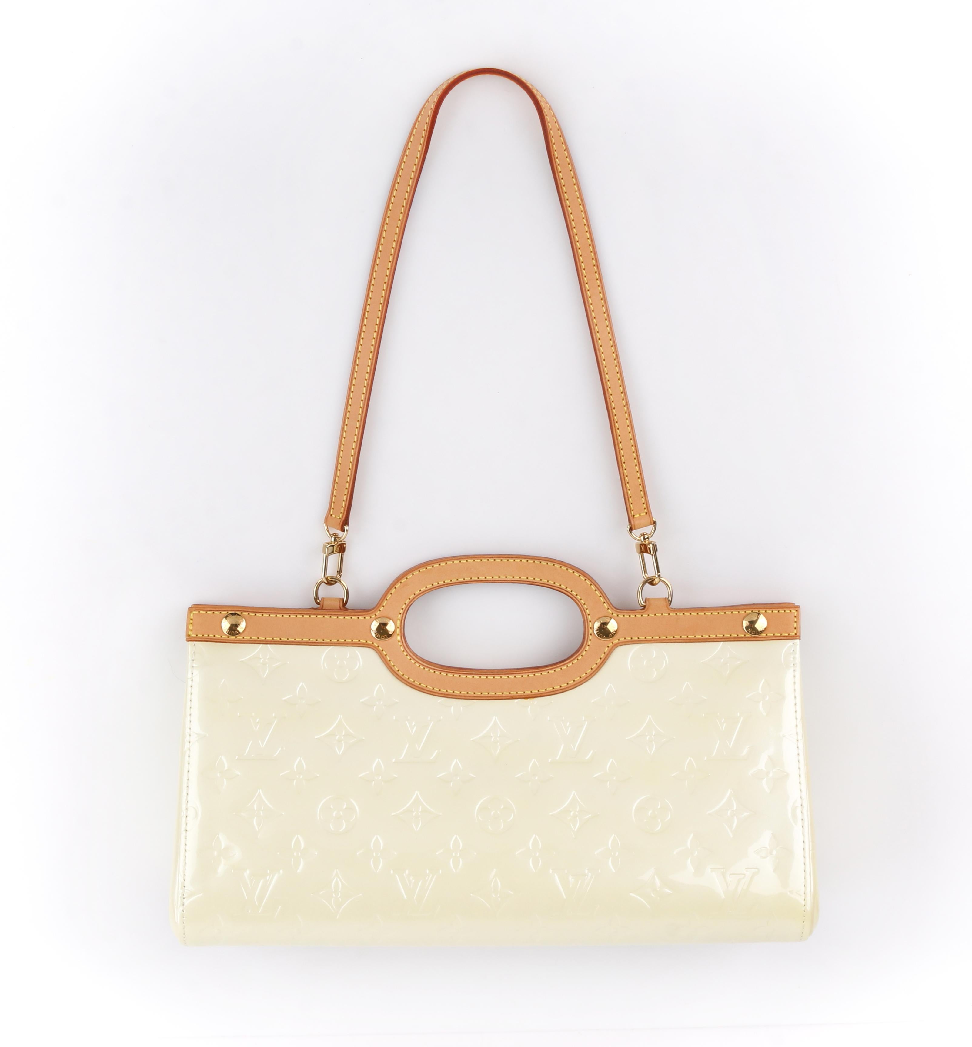 DESCRIPTION: LOUIS VUITTON Roxbury Drive Vernes Pearl Monogram Patent Leather Purse Handbag
 
Estimated Retail Value: $1,280
 
Brand / Manufacturer: Louis Vuitton 
Collection: Vernes
Style: LM0067
Color(s): shades of off white / light yellow (body)
