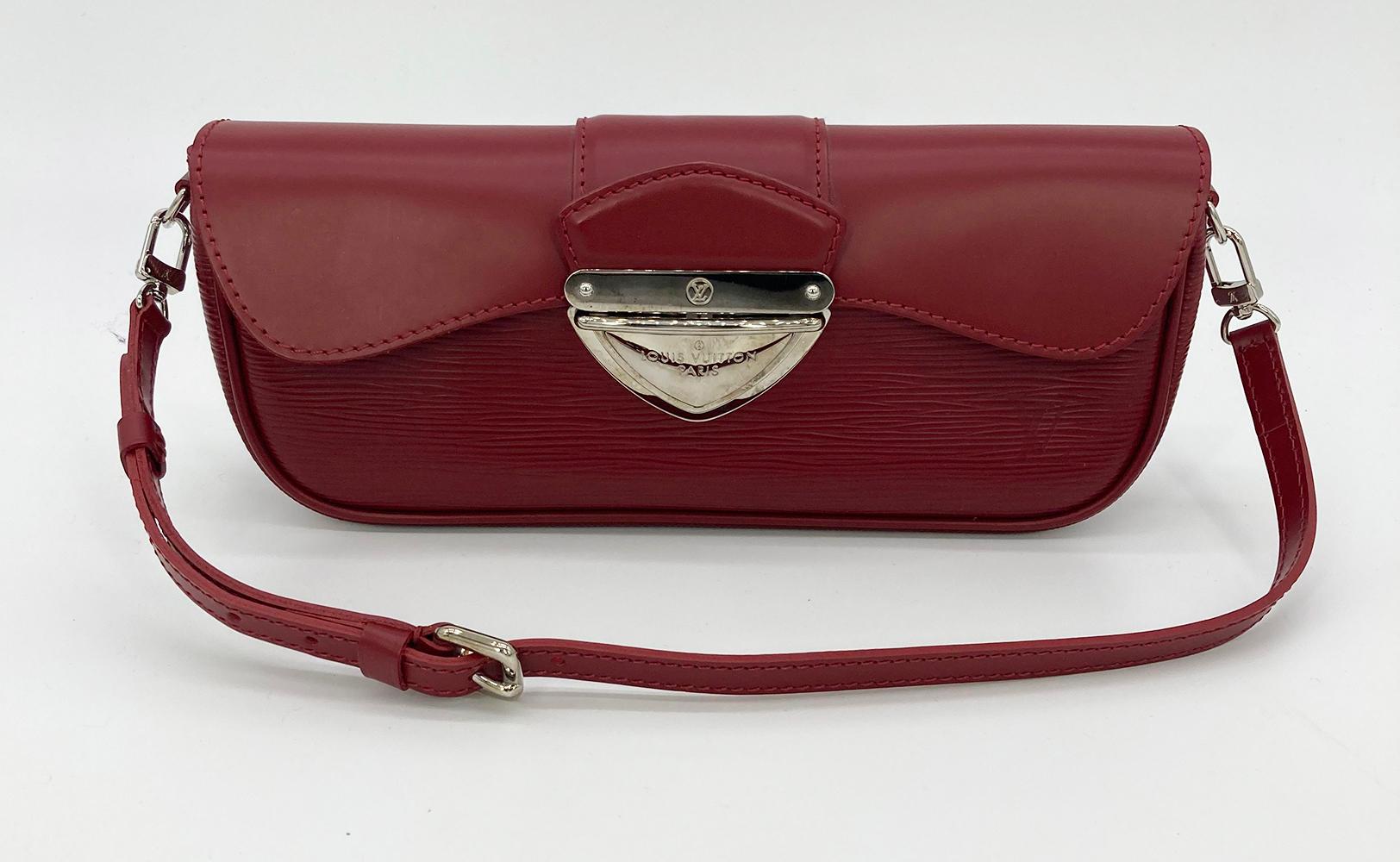Louis Vuitton Rubis Epi Leather Montaigne Clutch Bag in good condition. Red smooth and epi leather exterior trimmed with silver hardware and a removable shoulder strap. Top flap opens via sliding latch closure to a red suede interior with one side