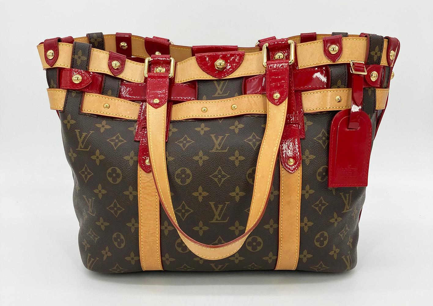 Louis Vuitton Rubis Salina GM Monogram Tote Bag in very good condition. Signature brown monogram canvas exterior trimmed with tan vachetta, cherry red patent, and red alligator leathers in a unique basket style design with gold hardware trim. Red