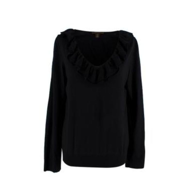 Louis Vuitton Black long sleeve top with ruffled neckline

-Round neckline 
-Ruffled detail neck 
-Long sleeve 
-Relaxed fit 
-Unlined 

Material: 

100% Wool 

Good condition 9/10.

Made in Italy 

PLEASE NOTE, THESE ITEMS ARE PRE-OWNED AND MAY