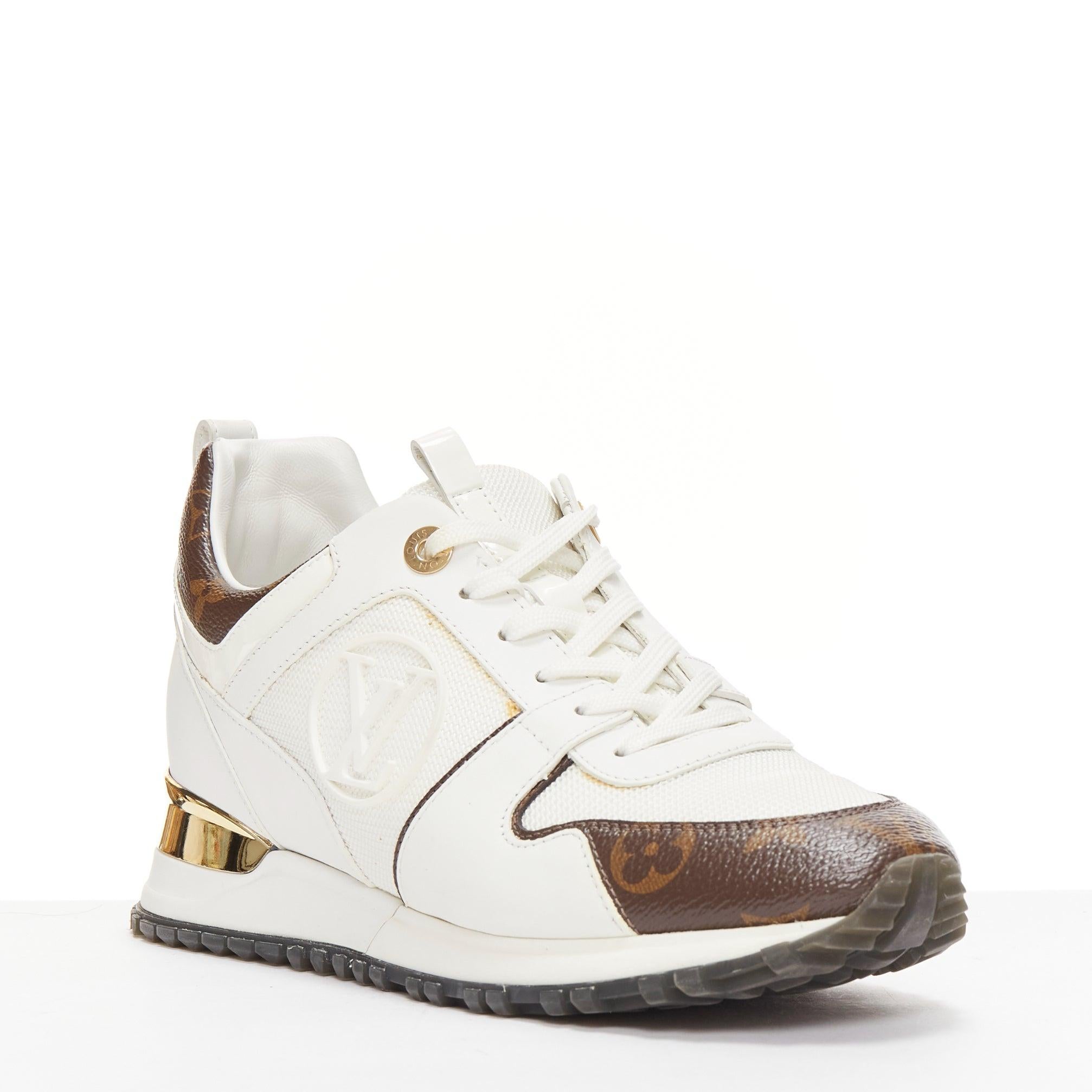 LOUIS VUITTON Run Away brown LV logo monogram white leather chunky sneakers EU38
Reference: AAWC/A01171
Brand: Louis Vuitton
Model: Run Away
Material: Leather, Mesh
Color: White, Brown
Pattern: Monogram
Closure: Lace Up
Lining: White Leather
Extra