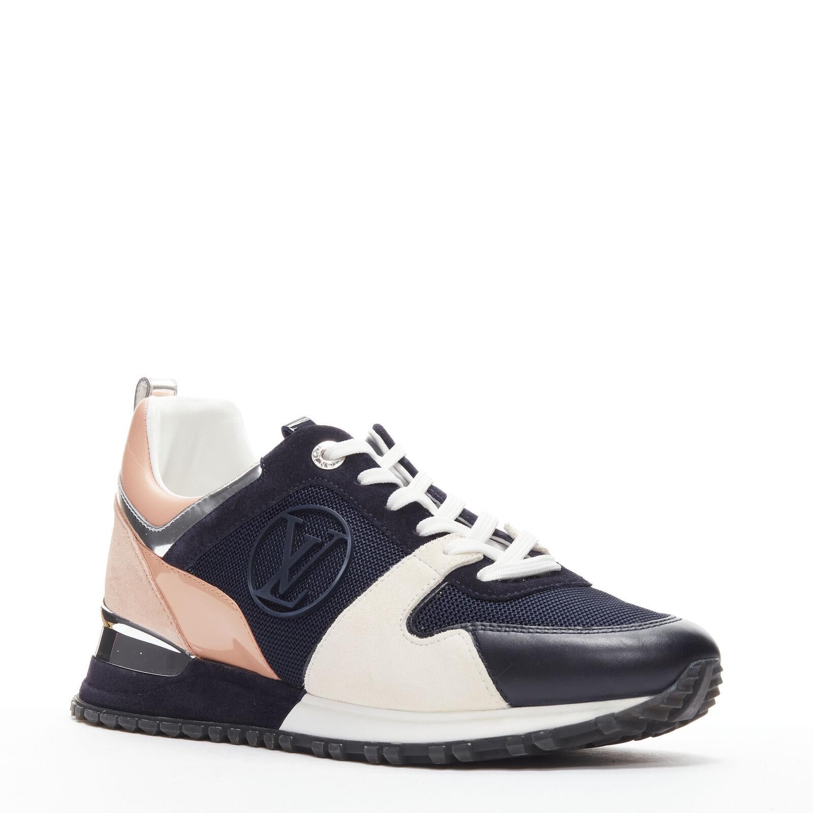 LOUIS VUITTON Run Away pink navy silver LV logo low top sneakers EU38 US8
Reference: AAWC/A00138
Brand: Louis Vuitton
Designer: Nicolas Ghesquiere
Model: Run Away
Material: Suede, Fabric
Color: Navy, Pink
Pattern: Solid
Closure: Lace Up
Lining: