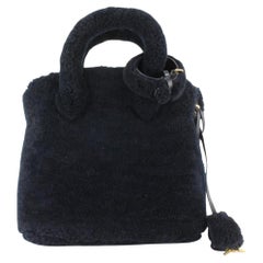 Louis Vuitton, Bags, Louis Vuitton Teddy Muffle Calfskin Monogram Black  Handwarmer Shoulder Bag