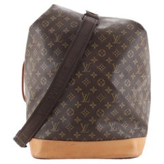 Lot - A Louis Vuitton leather and monogram canvas Sac Marin duffle, late  20th century
