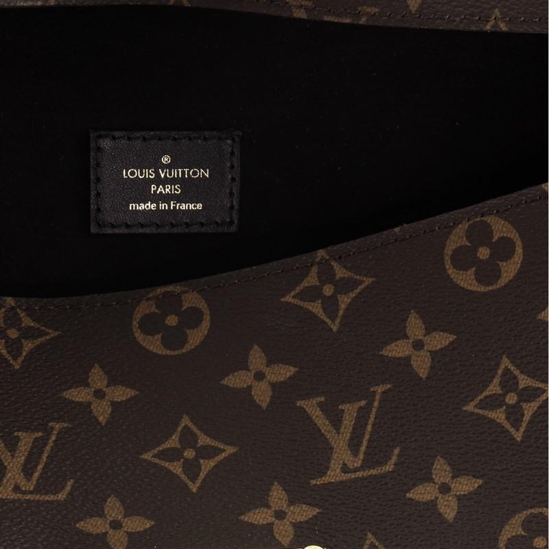 Louis Vuitton Sac Triangle Handbag Monogram Canvas PM In Good Condition In NY, NY