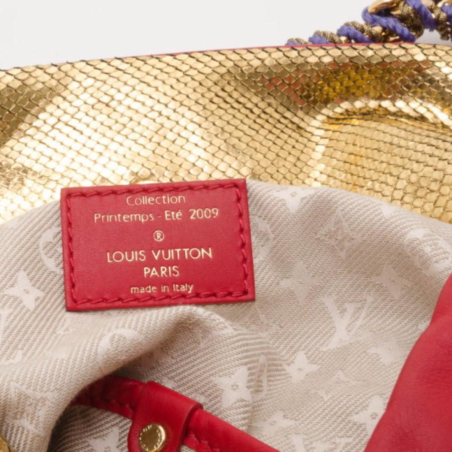 Red Louis Vuitton Safari Flight Bag