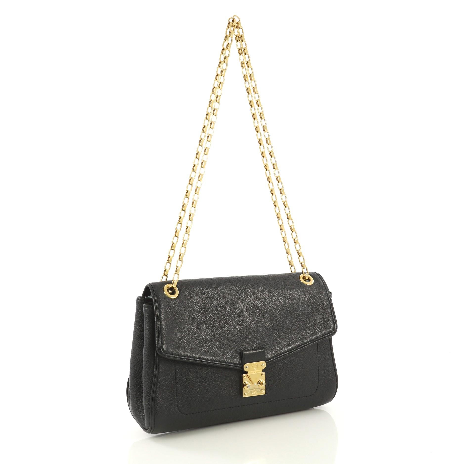 This Louis Vuitton Saint Germain Handbag Monogram Empreinte Leather PM, crafted from black monogram empreinte leather, features chain link shoulder strap and gold-tone hardware. Its S-lock closure opens to a black microfiber interior with zip