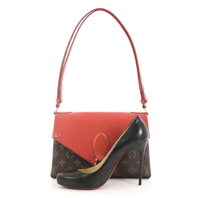 This Louis Vuitton Saint Michel Handbag Monogram Canvas and Epi Leather, crafted in brown monogram coated canvas and red epi leather, features a red leather shoulder strap, exterior back pocket, and silver-tone hardware. Its magnetic snap button