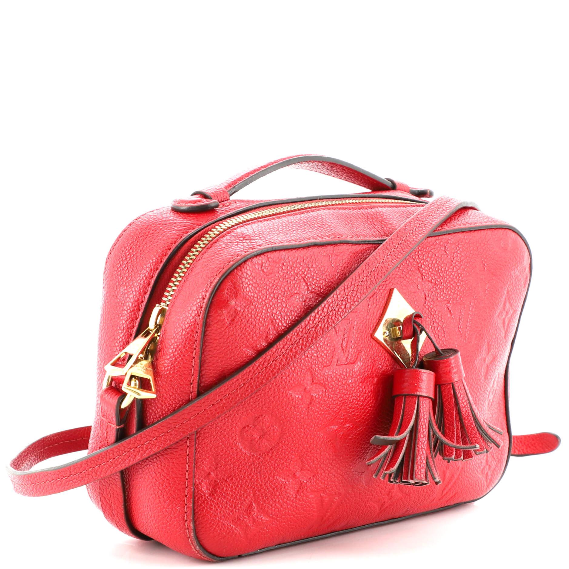 Condition: Fair. Odor in interior. Heavy wear on exterior corners and strap, moderate creasing on exterior and strap. Peeling, melting and indentations on strap. Moderate wear, darkening and stains in interior, scratches, tarnish and discoloration
