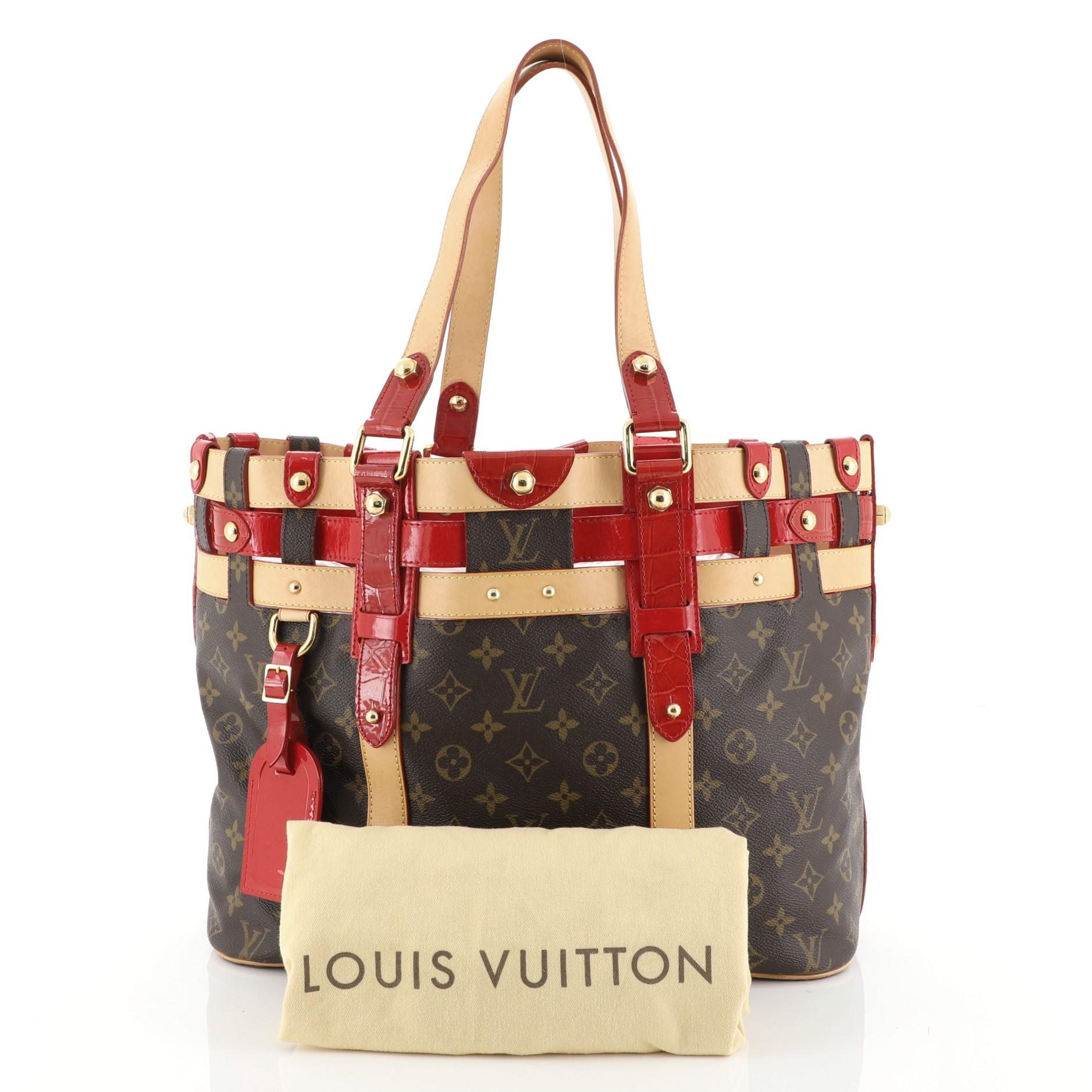 This Louis Vuitton Salina Handbag Limited Edition Rubis Monogram Canvas MM, crafted in brown monogram coated canvas, features dual flat leather handles, natural leather trim, red patent crocodile embossed leather, protective base studs and gold-tone