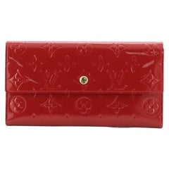 Louis Vuitton Monogram Sarah Wallet NM-dress. Raleigh