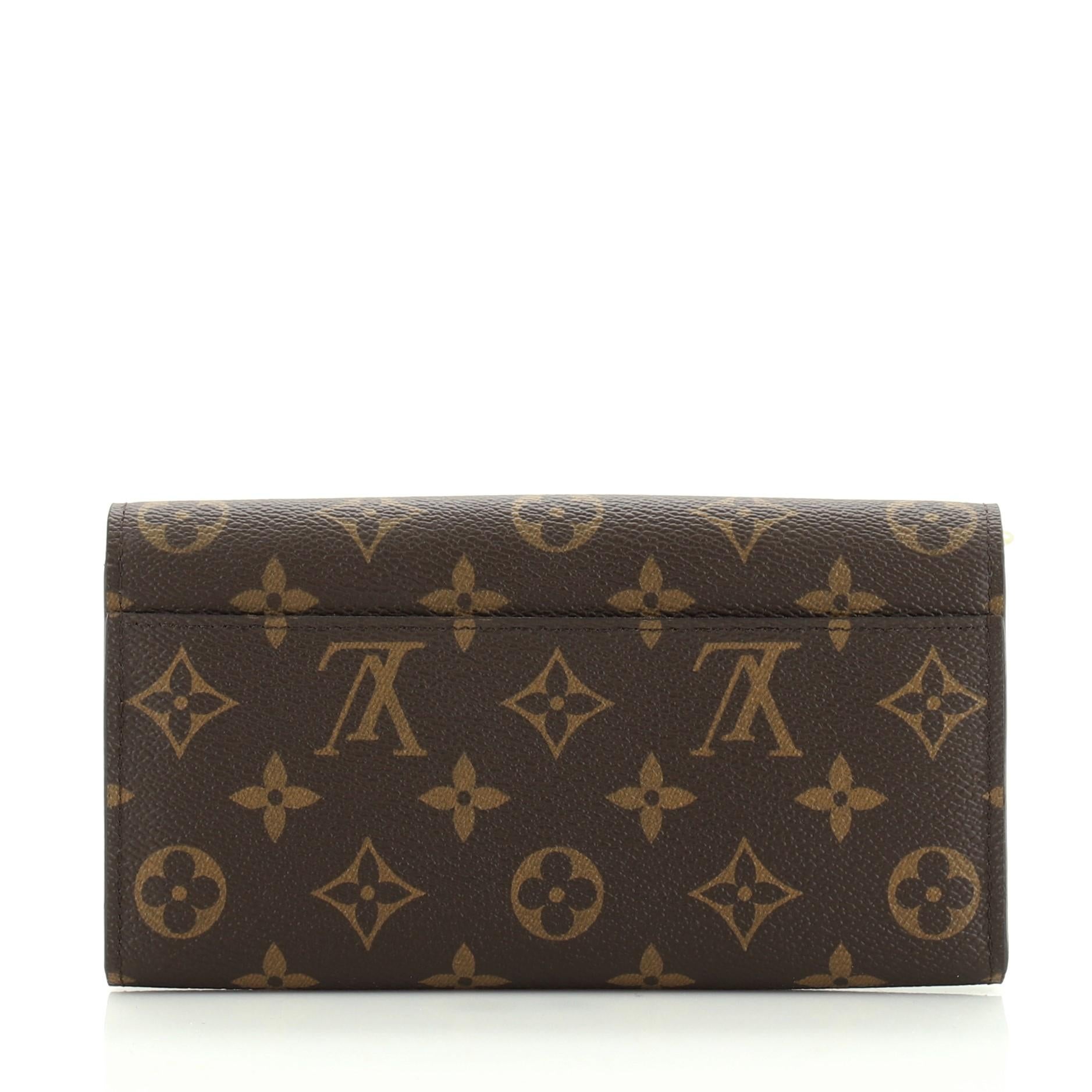 Louis Vuitton Sarah Wallet NM Monogram Canvas In Good Condition In NY, NY