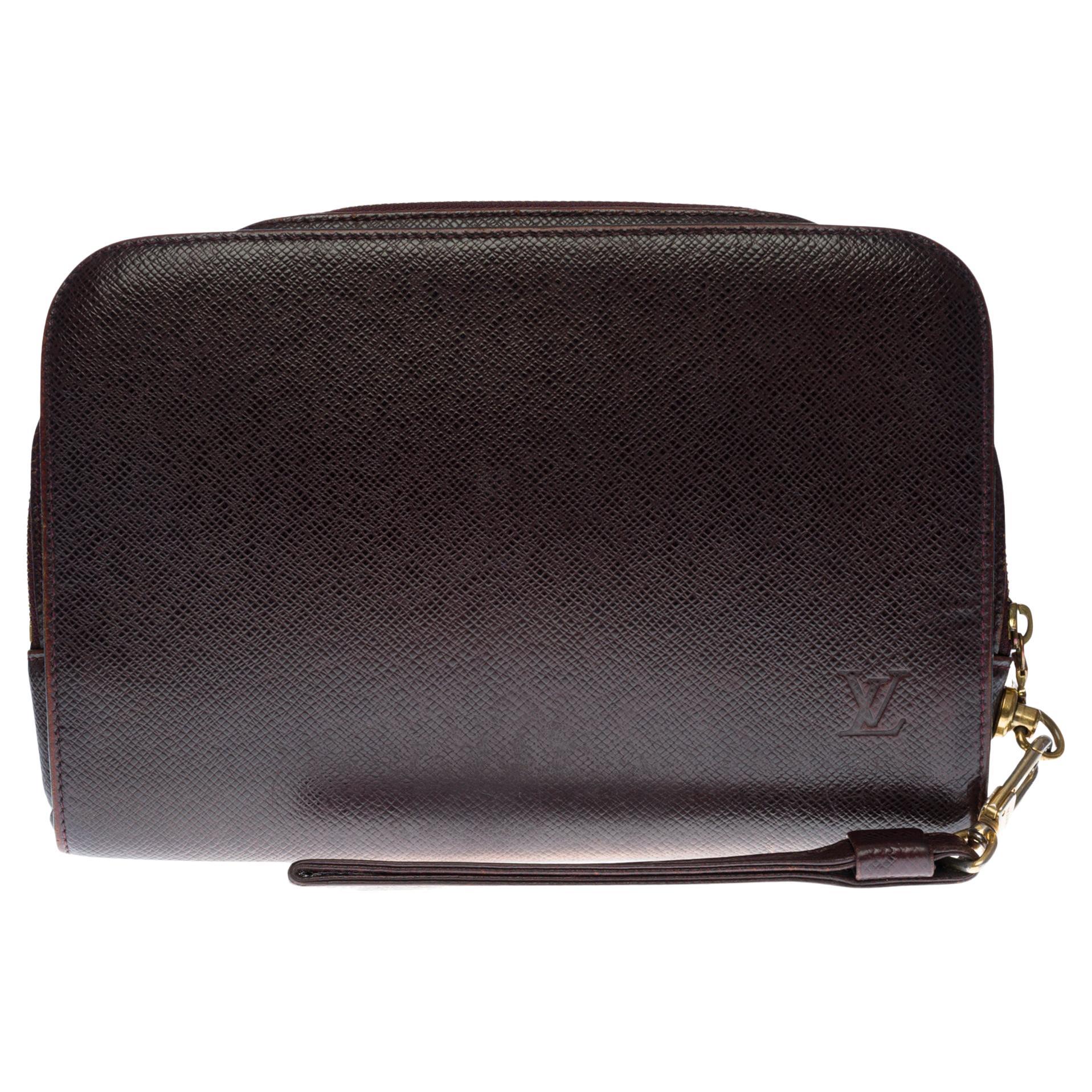 Louis Vuitton Satchel in brown Taïga leather and gold hardware