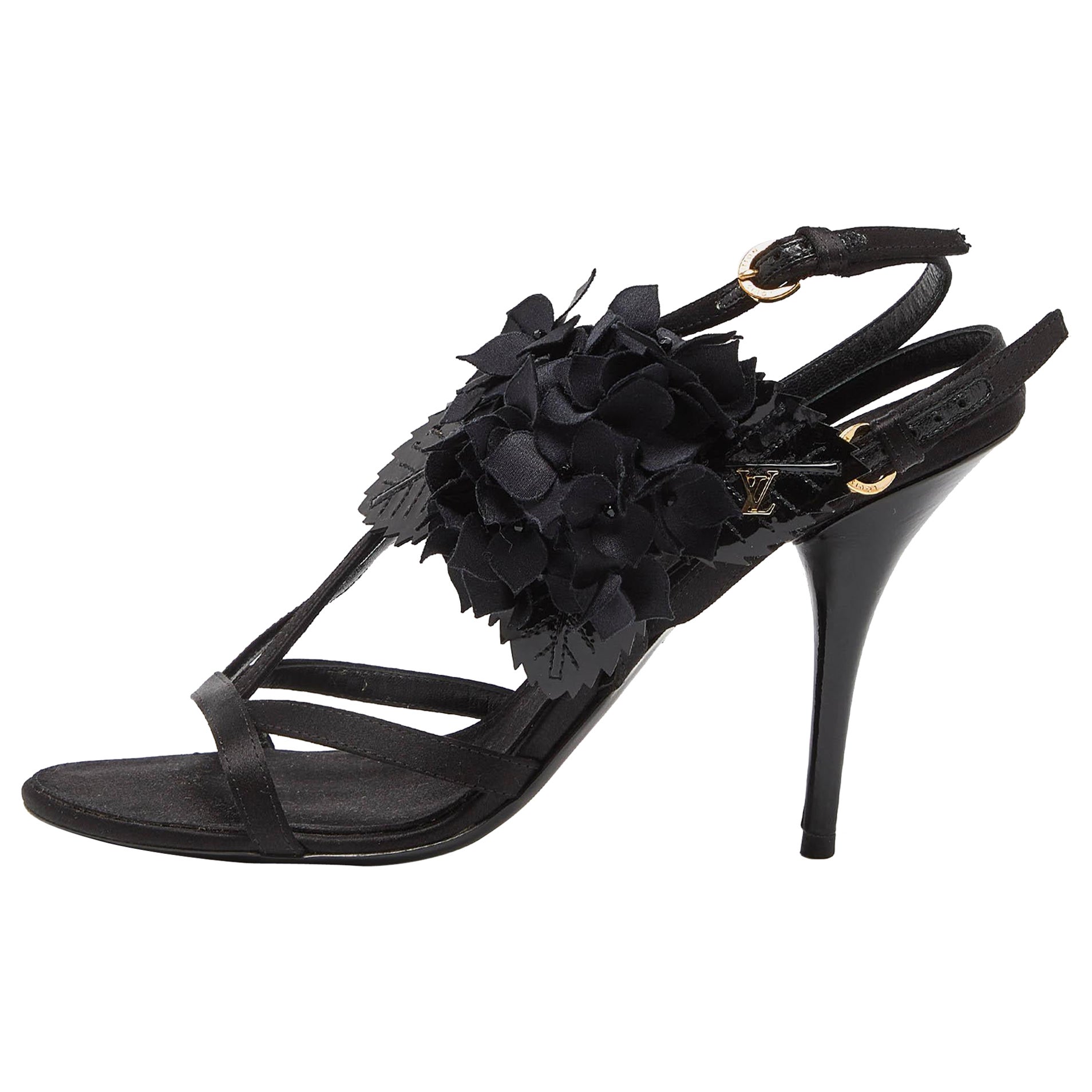 Louis Vuitton Sandalias con tira al tobillo de charol satinado con adornos Talla 38.5