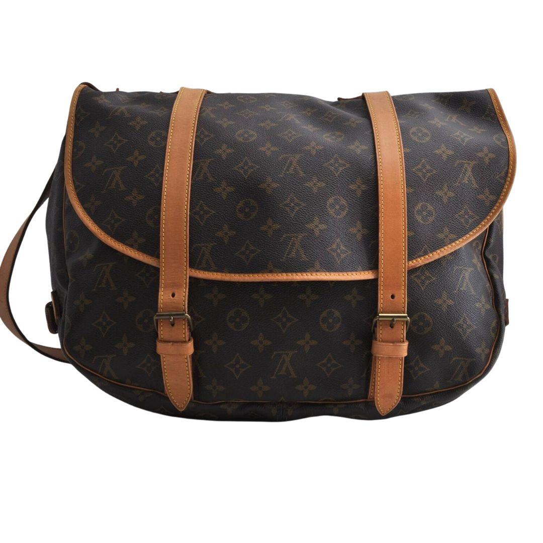 Authenticity: 100% AUTHENTIC!
A trendy and classy bag that will make you cool and elegant.
No longer available in stores. Discontinued.

Exterior: Minor stains on the leather parts, minor stains, and rubs on the corners, minor spots and scratches on