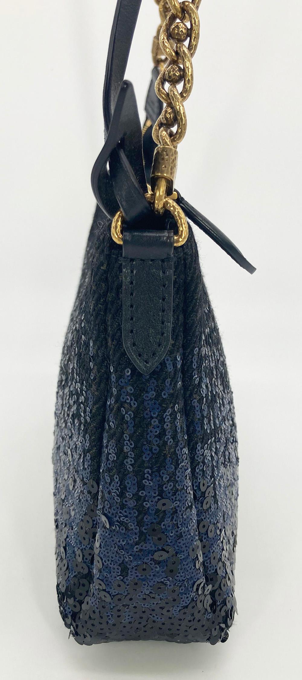 Louis Vuitton Sequin Reverie Pochette in excellent condition. Navy and gray plaid woven wool trimmed with black and navy sequins in an ombre pattern from the bottom up. navy leather strap can be removed completely, worn as a shoulder strap, or as a