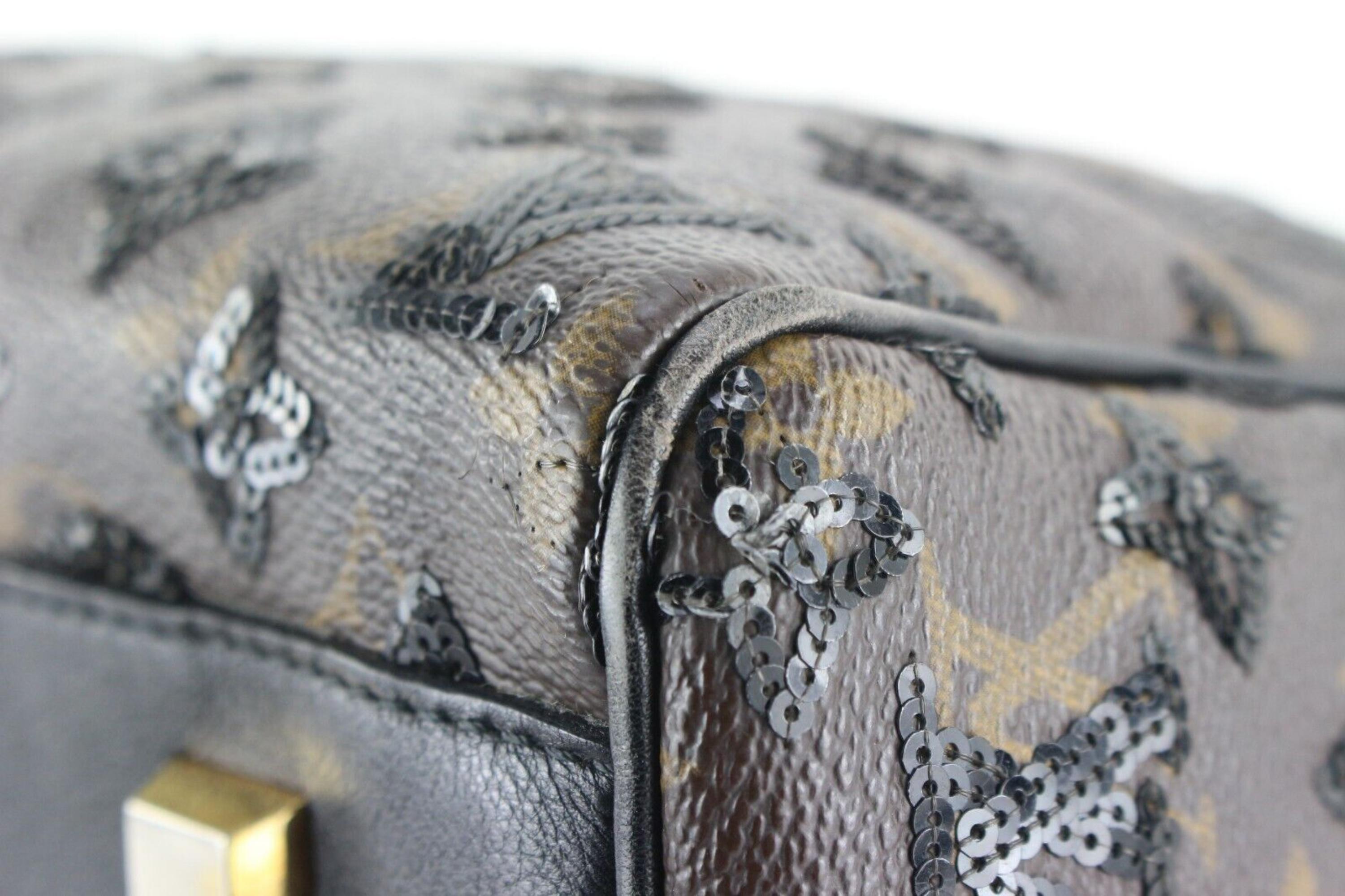 Louis Vuitton Sequins Monogram Eclipse Speedy 28 2LVJ0104
Date Code/Serial Number: Not Legible

Made In: France

Measurements: Length:  11