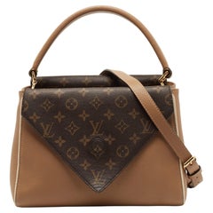 Louis Vuitton - Sac à double V en toile et cuir avec monogramme Sesame