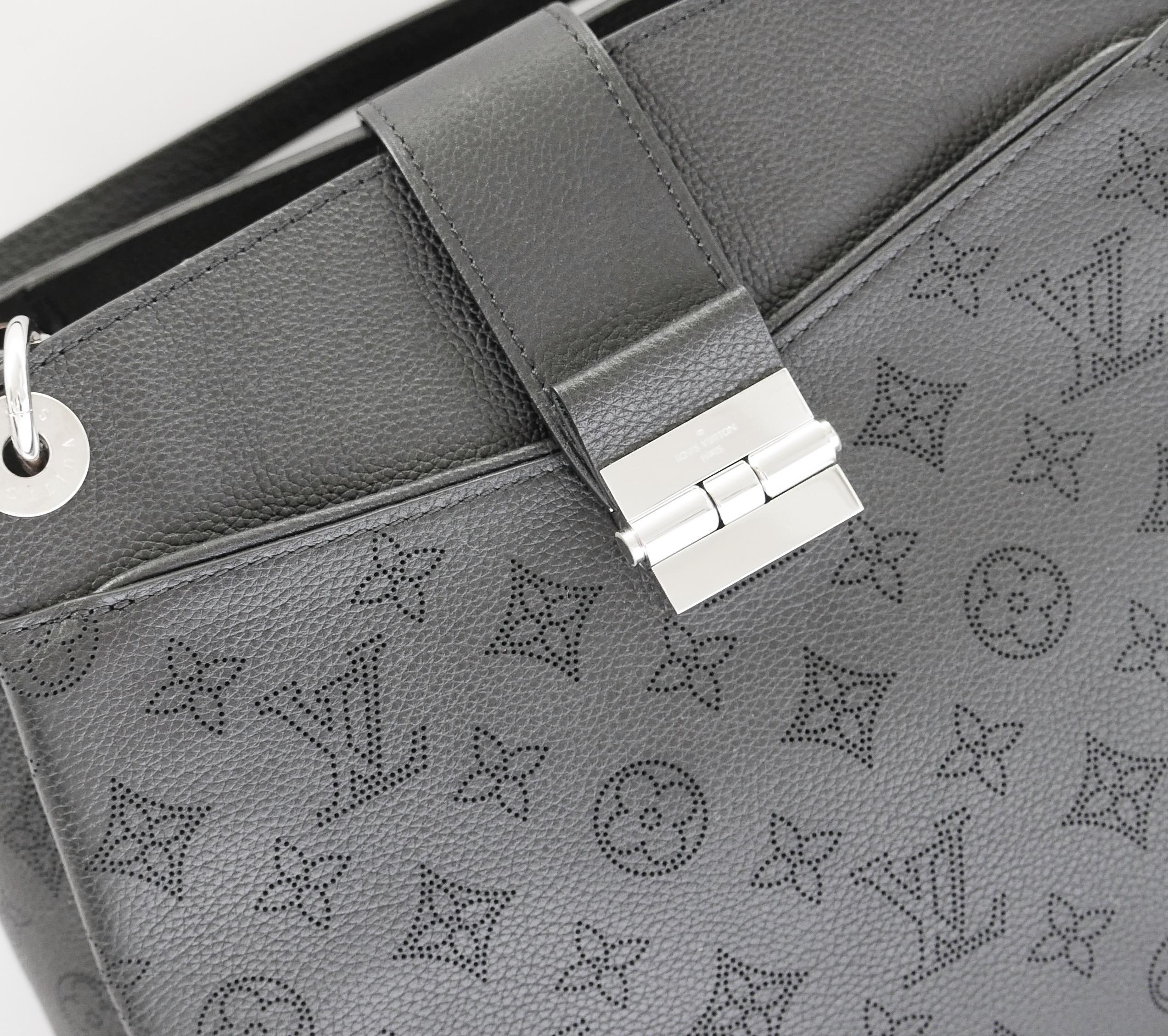 Gorgeous Louis Vuitton Sevres Mahina Noir bag. Unworn with dustbag, care leaflet, sticker/tag and keyring fob which has not yet been attached to bag . Made from black monogram Mahina leather with silver tone hardware and 2 shoulder straps. Lined in