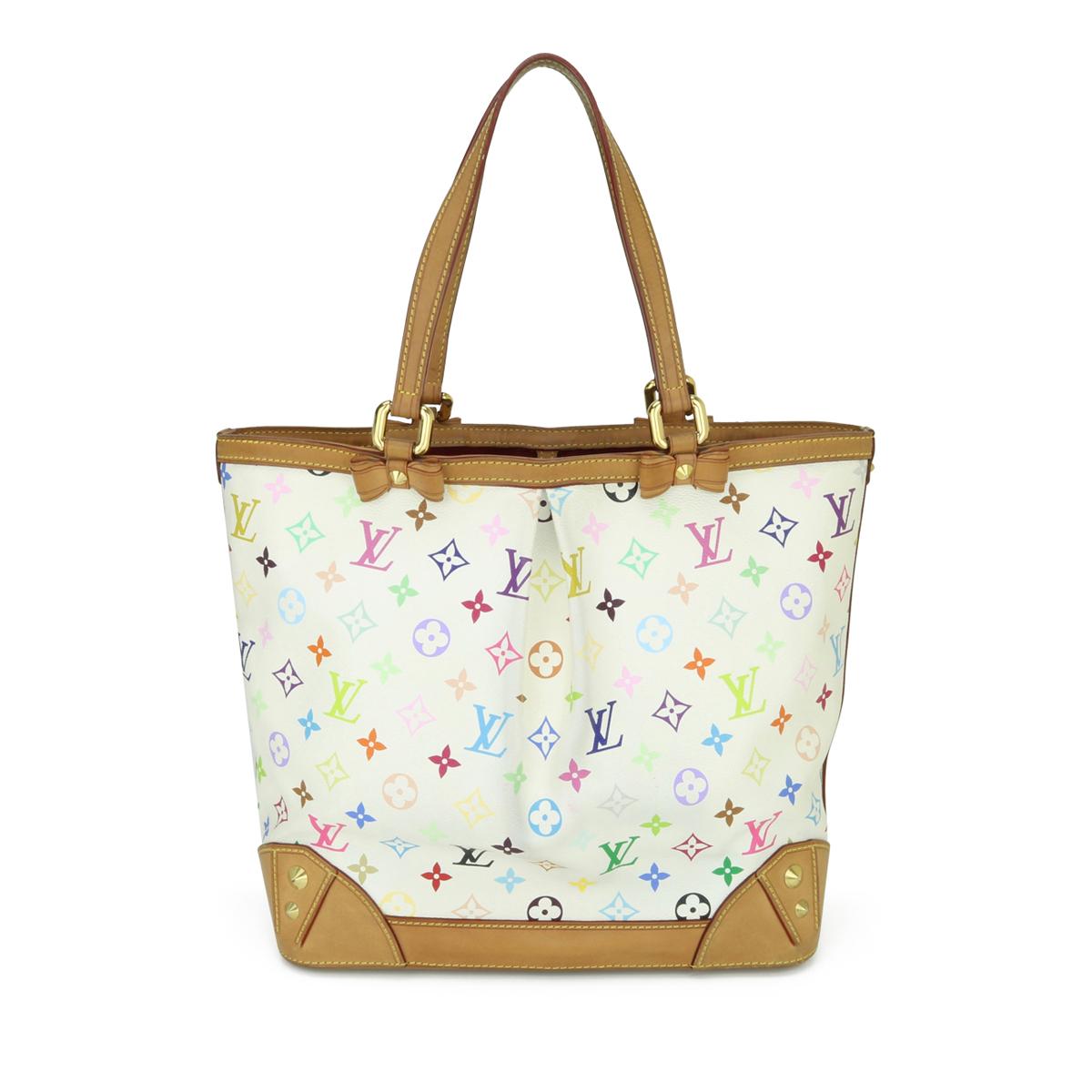 Louis Vuitton Sharleen MM Tote Bag in White Multicolore Monogram 2011.

This bag is in good condition. 

- Exterior Condition: Good condition. Rubbing to four base corners. Marking, darkening and leather wear to the vachetta leather. Storage