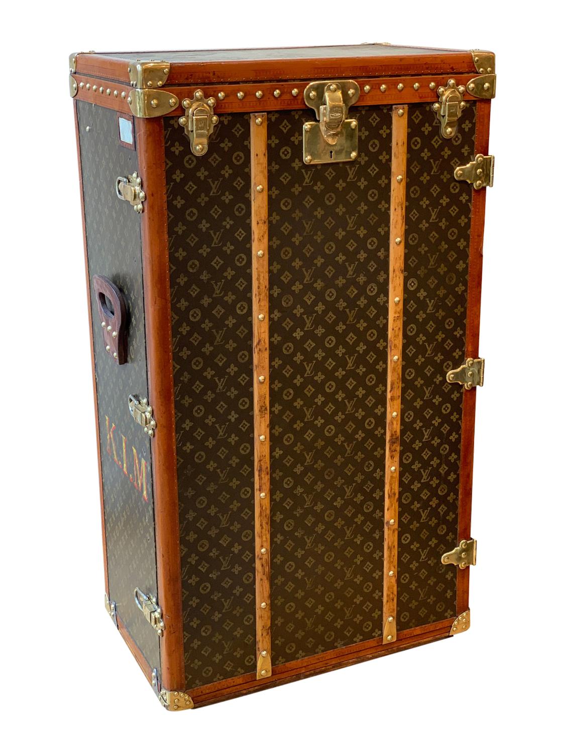 A Louis Vuitton Lily Pons Shoe Trunk, circa 1925 in L.V. monogrammed canvas. The trunk is complete and original with the initials K.I.M to each side. The trunk is fitted for thirty pairs of shoes and compartments top and bottom for silk stockings.