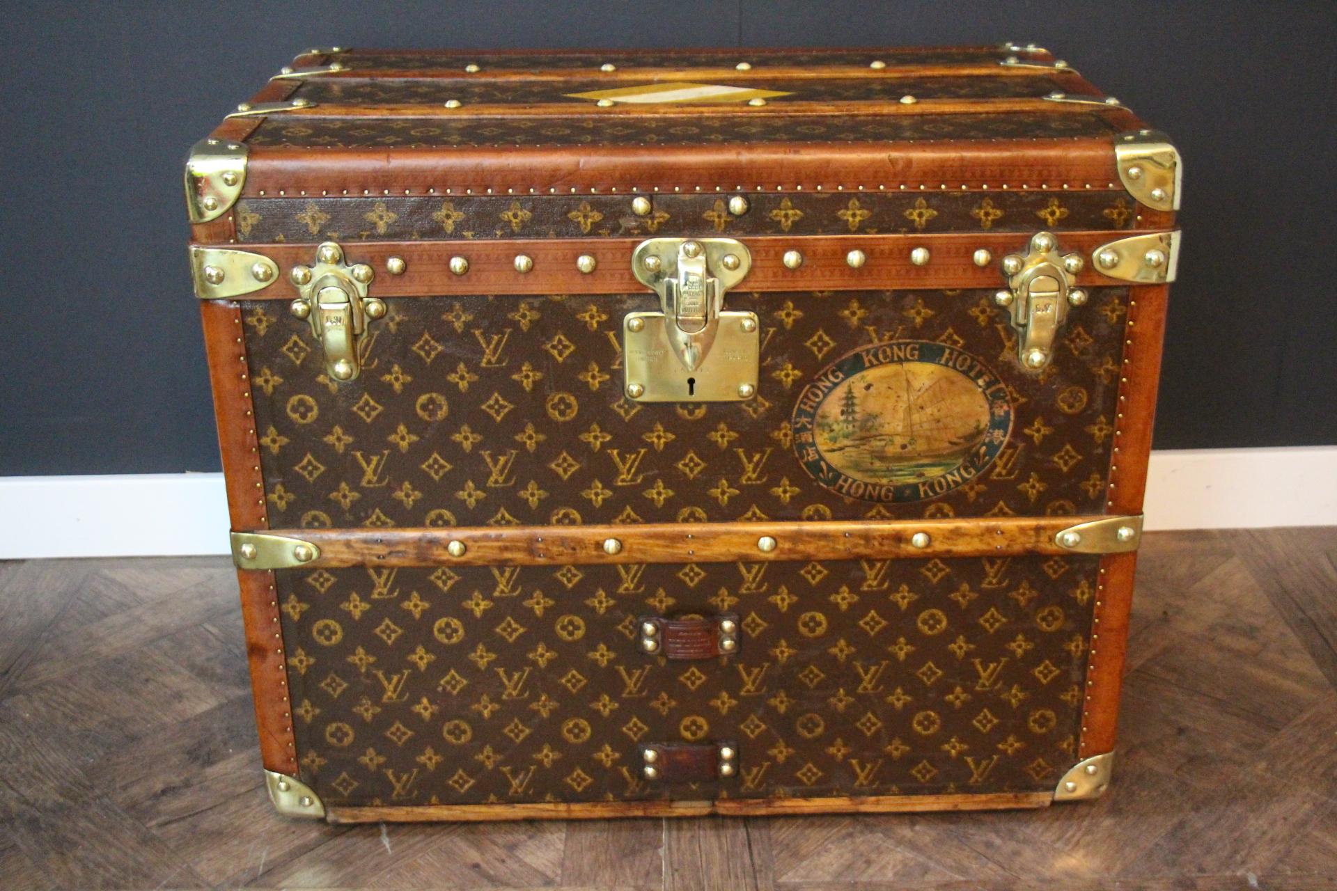 This magnificent Louis Vuitton shoe trunk features stenciled canvas monogram, Louis Vuitton stamped solid brass locks, brass studs and leather side handles. Its leather side handles are embossed Louis Vuitton. units clamps. It also has got a