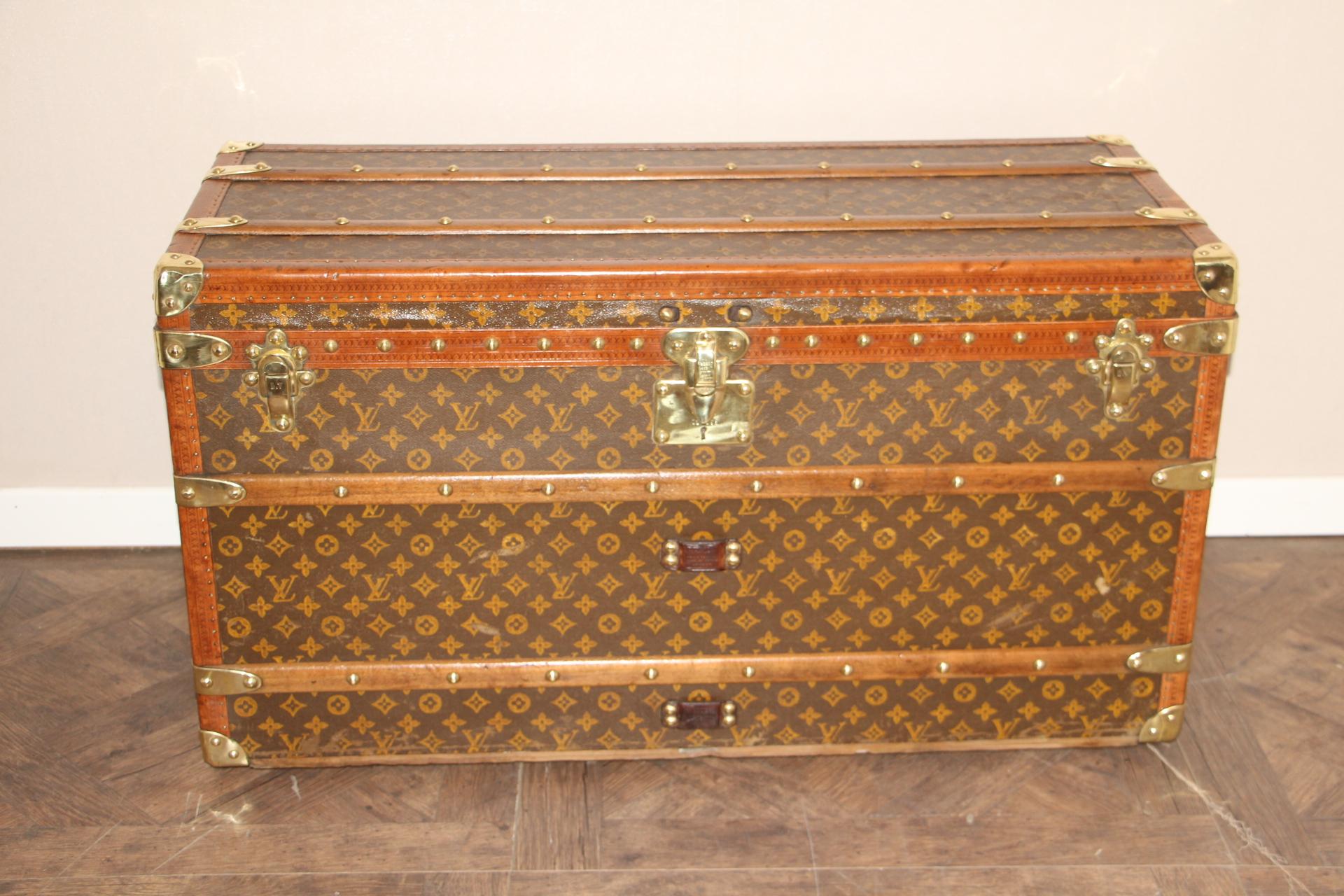 This magnificent Louis Vuitton shoe trunk features stenciled canvas monogram, Louis Vuitton stamped solid brass locks, studs and side handles. It also has got honey lozine trim.
Painted customized stripes on its sides. It has got a beautiful and