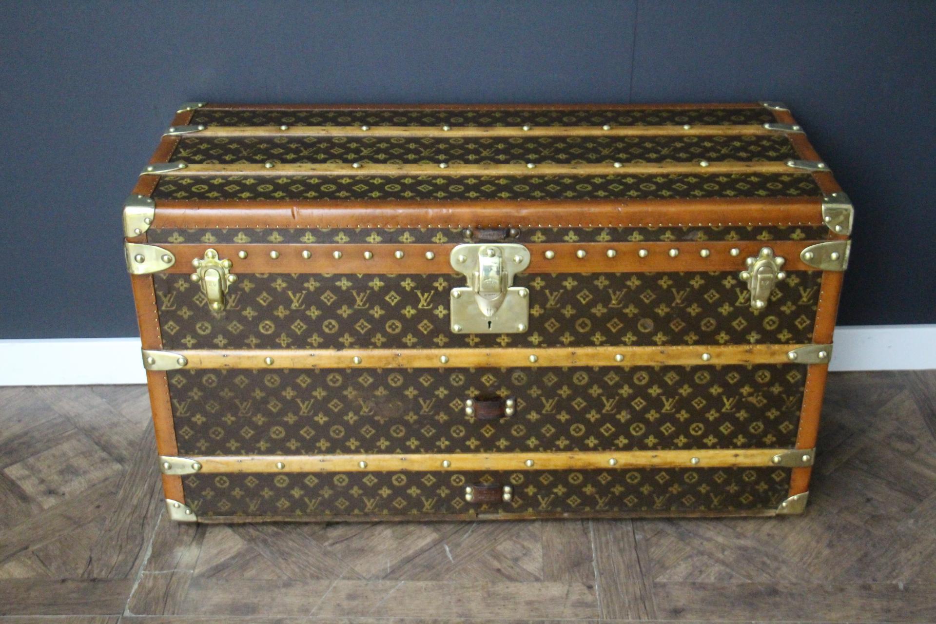 This magnificent Louis Vuitton shoe trunk features stenciled canvas monogram, Louis Vuitton stamped solid brass locks, studs and large leather side handles. It also has got honey color lozine trim. Its main lock has got an engraved lock number.
This