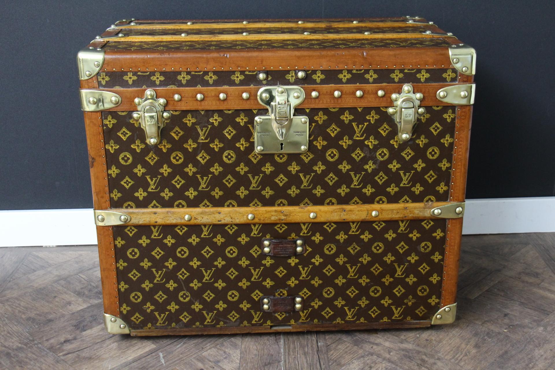 This magnificent Louis Vuitton shoe trunk features hand painted stenciled canvas monogram, Louis Vuitton stamped solid brass locks, brass studs and leather side handles. This Vuitton trunk also has got a magnificent honey color lozine trim.
Its hand