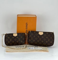 Louis Vuitton - Sac à bandoulière multi-pochettes avec accessoires en toile monogrammée marron