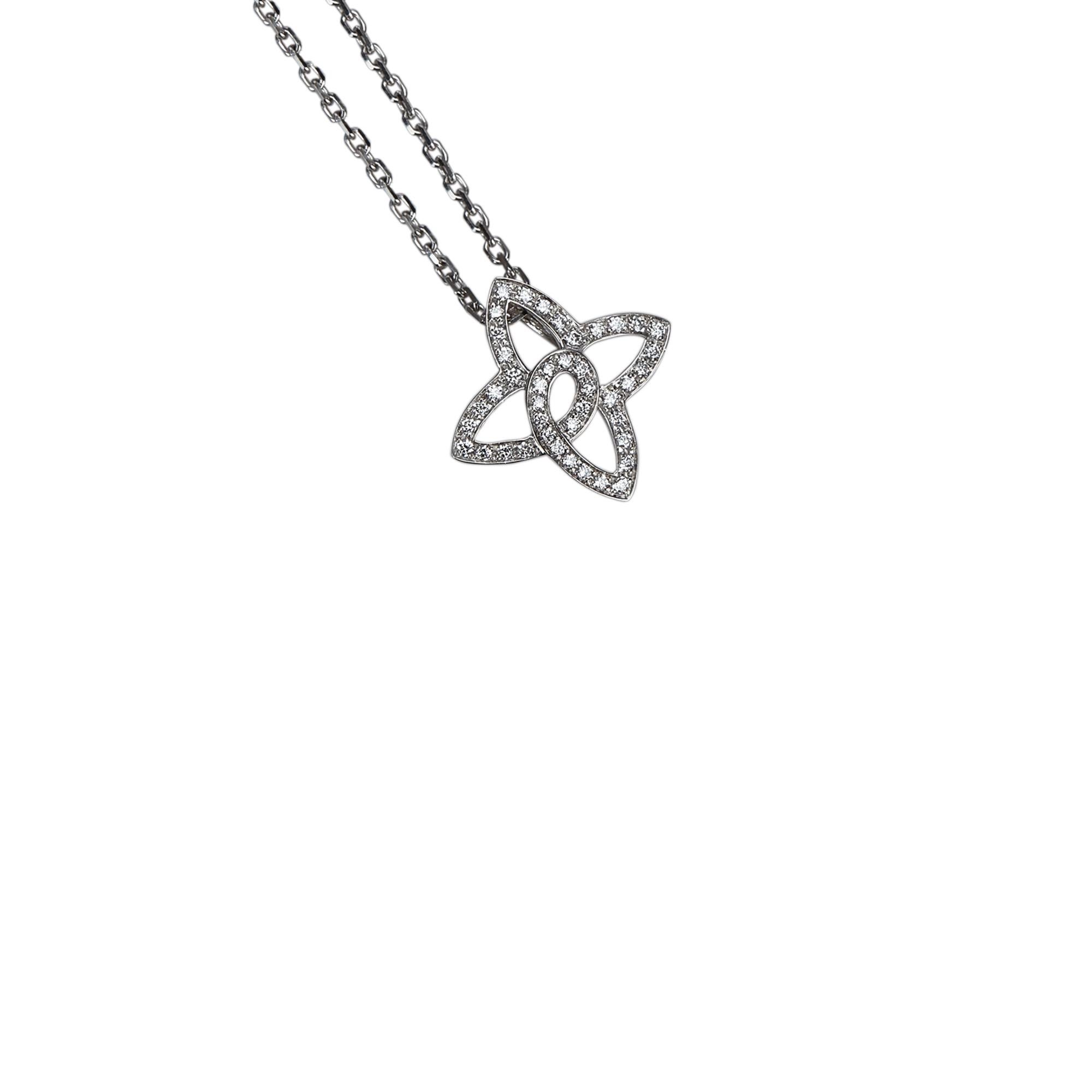 This necklace features a diamond set in an 18K white gold quatrefoil pendant, silver-tone neck chain, and a lobster closure. Weight 6.0 g. It carries as AB condition rating.

Inclusions: 
Box


Louis Vuitton pieces do not come with an authenticity