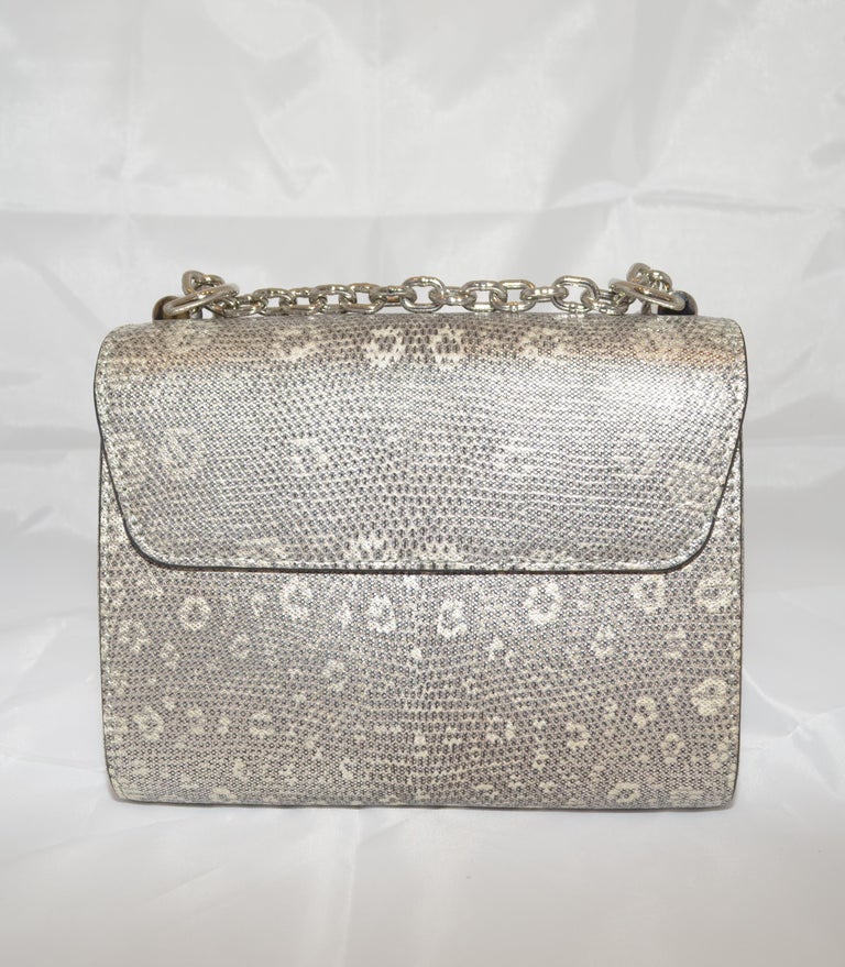 Louis Vuitton Silver Lizard Twist PM Handbag Limited Edition with Cites at  1stDibs  louis vuitton lizard bag, louis vuitton twist lizard, louis  vuitton rhinestone bag