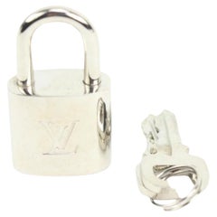 Louis Vuitton Brushed Silver Matte Padlock and Key Set Cadena Lock Bag  Charm 111 at 1stDibs