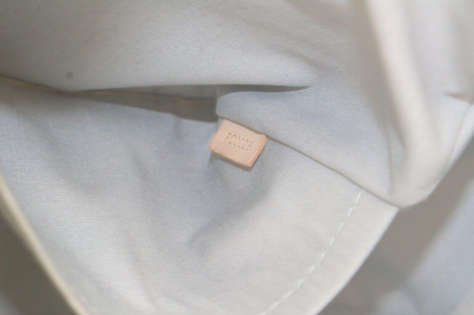 
Date Code/Serial Number: FO0028

Made In: Italy

Measurements: Length:  15