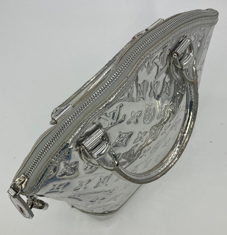 Louis Vuitton Silver Mirror Lockit Bag For Sale at 1stDibs