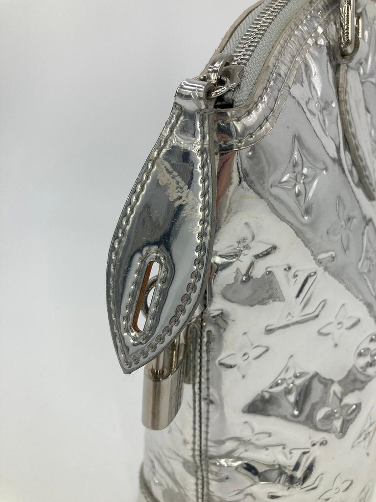 Lockit leather handbag Louis Vuitton Silver in Leather - 36966925
