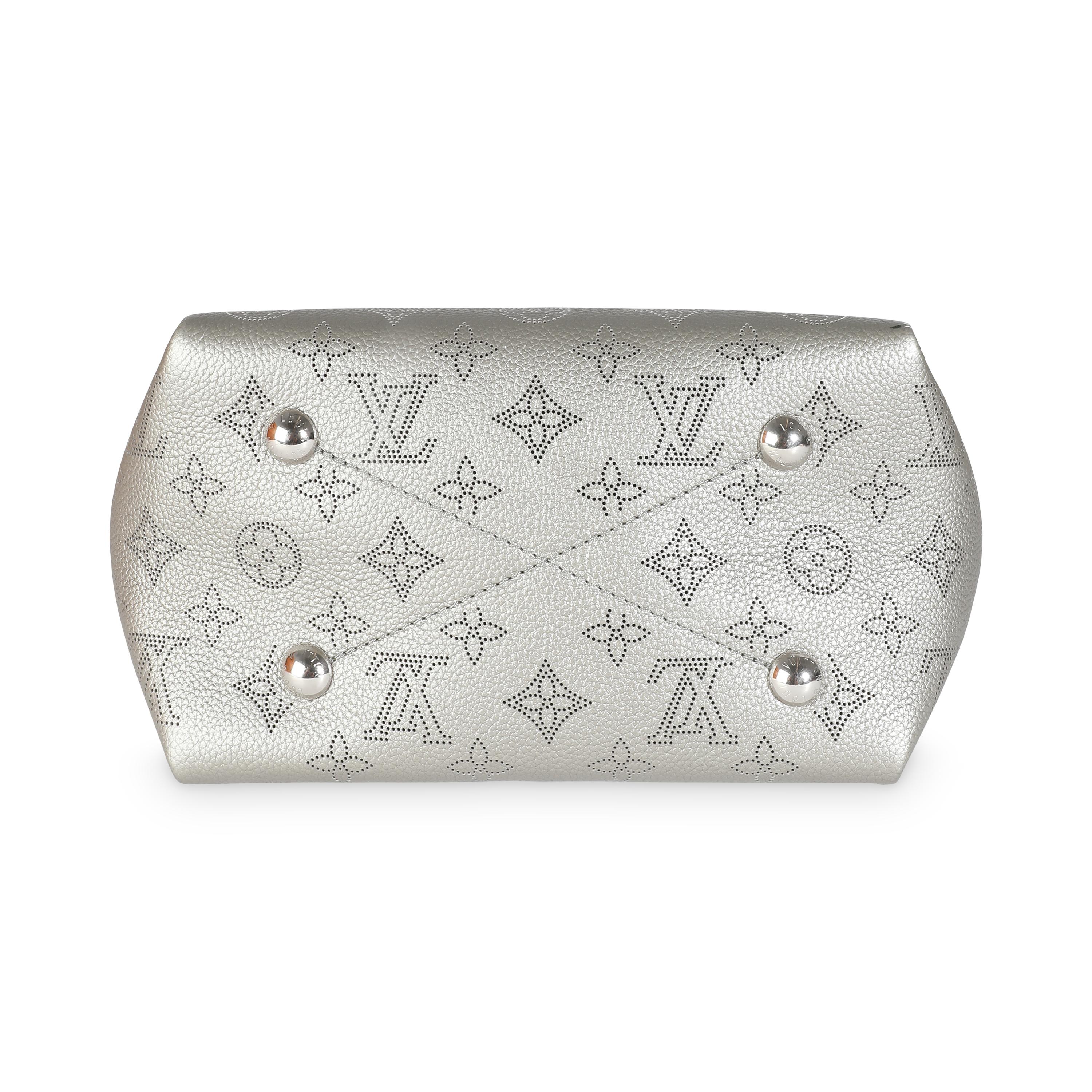 Listing Title: Louis Vuitton Silver Monogram Mahina Bella
SKU: 141481
MSRP: 4150.00 USD
Condition: Pre-owned 
Handbag Condition: Excellent
Condition Comments: Item is in excellent condition and displays light signs of wear. Light scratches along