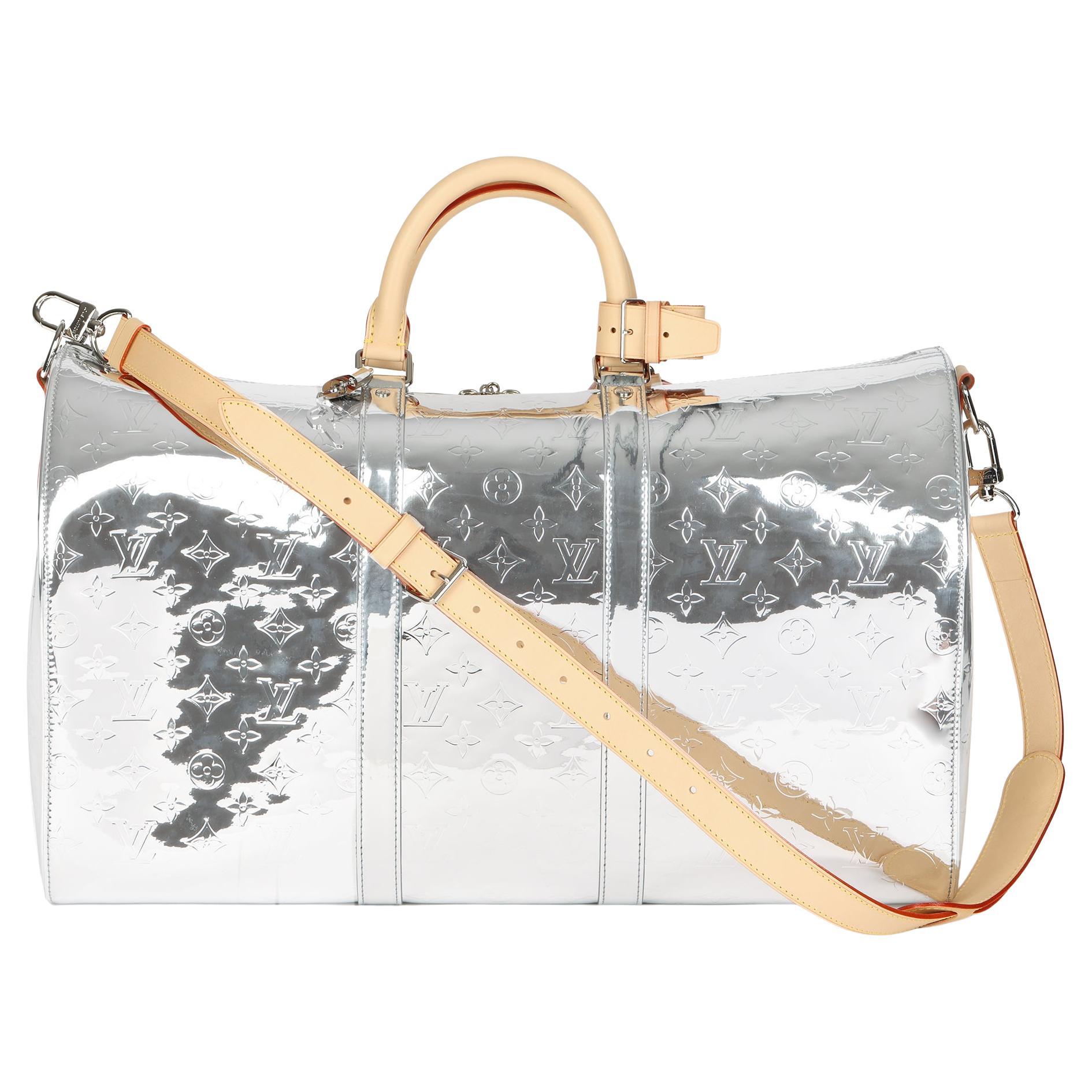 Louis Vuitton on X: Crafted in space-age Monogram Titanium canvas