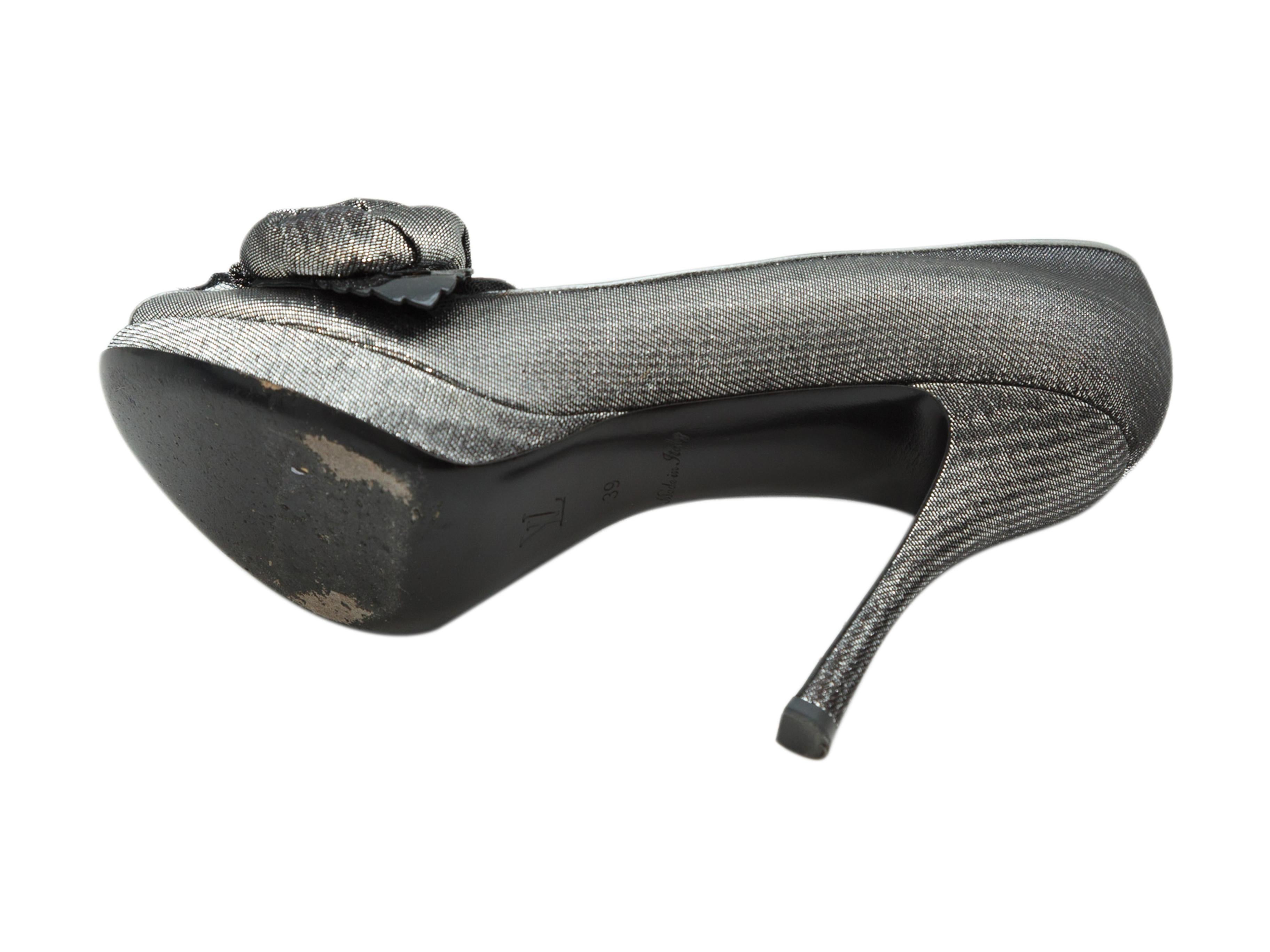 Product details: Silver peep-toe platform pumps by Louis Vuitton. Rosette accent at vamps. Covered heels. Designer size IT39. 4.5