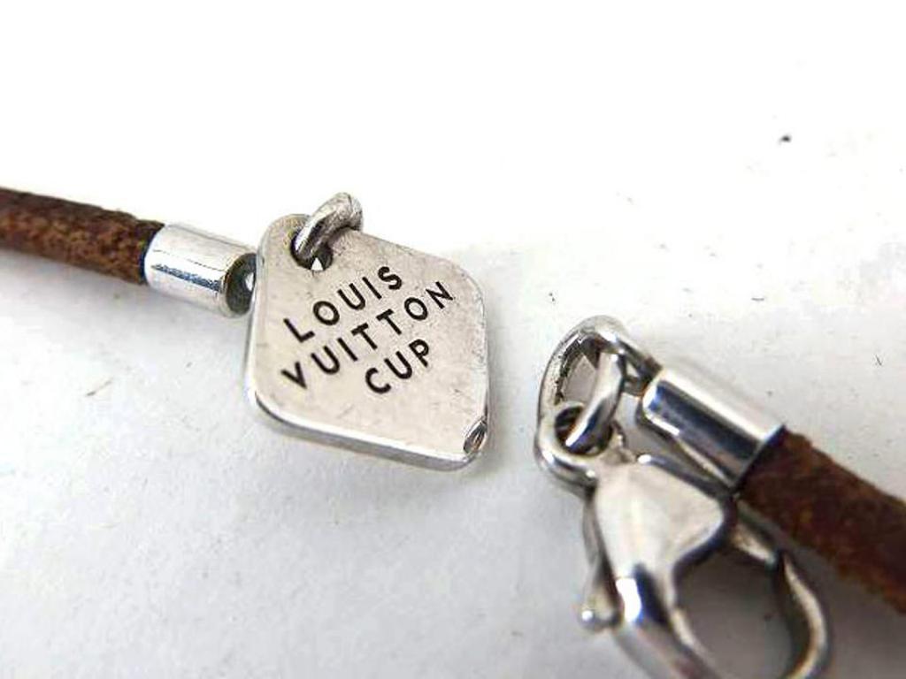 Louis Vuitton Silver X Brown Dolphin Charm 02138360 Necklace In Good Condition For Sale In Forest Hills, NY