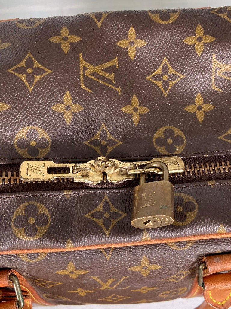Vintage leather Louis Vuitton suitcase - Pinth Vintage Luggage
