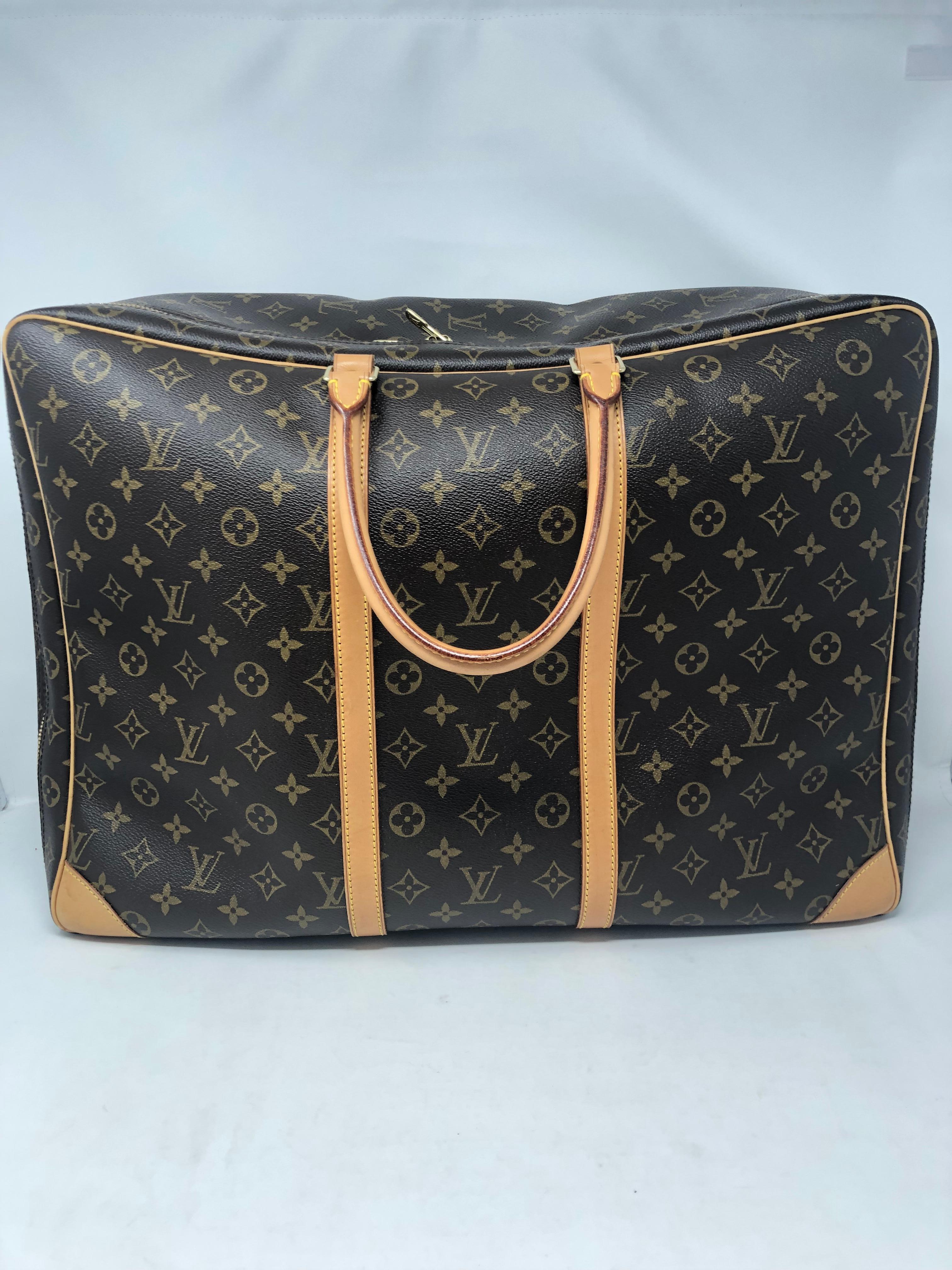 Louis Vuitton Sirius Luggage. Carry on size. Monogram LV luggage. Mint condition. Clean interior. No odors. A classic travel companion. Guaranteed authentic. 