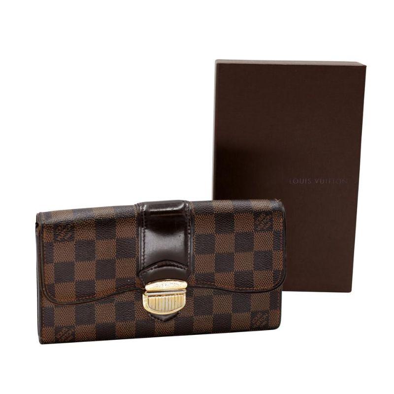 Louis Vuitton Sistina Damier Ebene GM Wallet LV-W0107P-0002

This Louis Vuitton Monogram Sistina Wallet is the most elegant way to organize your essentials like your bills, currency, credit cards and plenty of coins. This delightful piece will