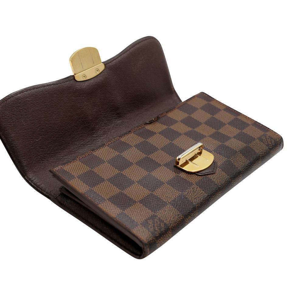Louis Vuitton Sistina Damier Ebene GM Wallet LV-W1217P-0007

This Louis Vuitton Monogram Sistina Wallet is the most elegant way to organize your essentials like your bills, currency, credit cards and plenty of coins. This delightful piece will
