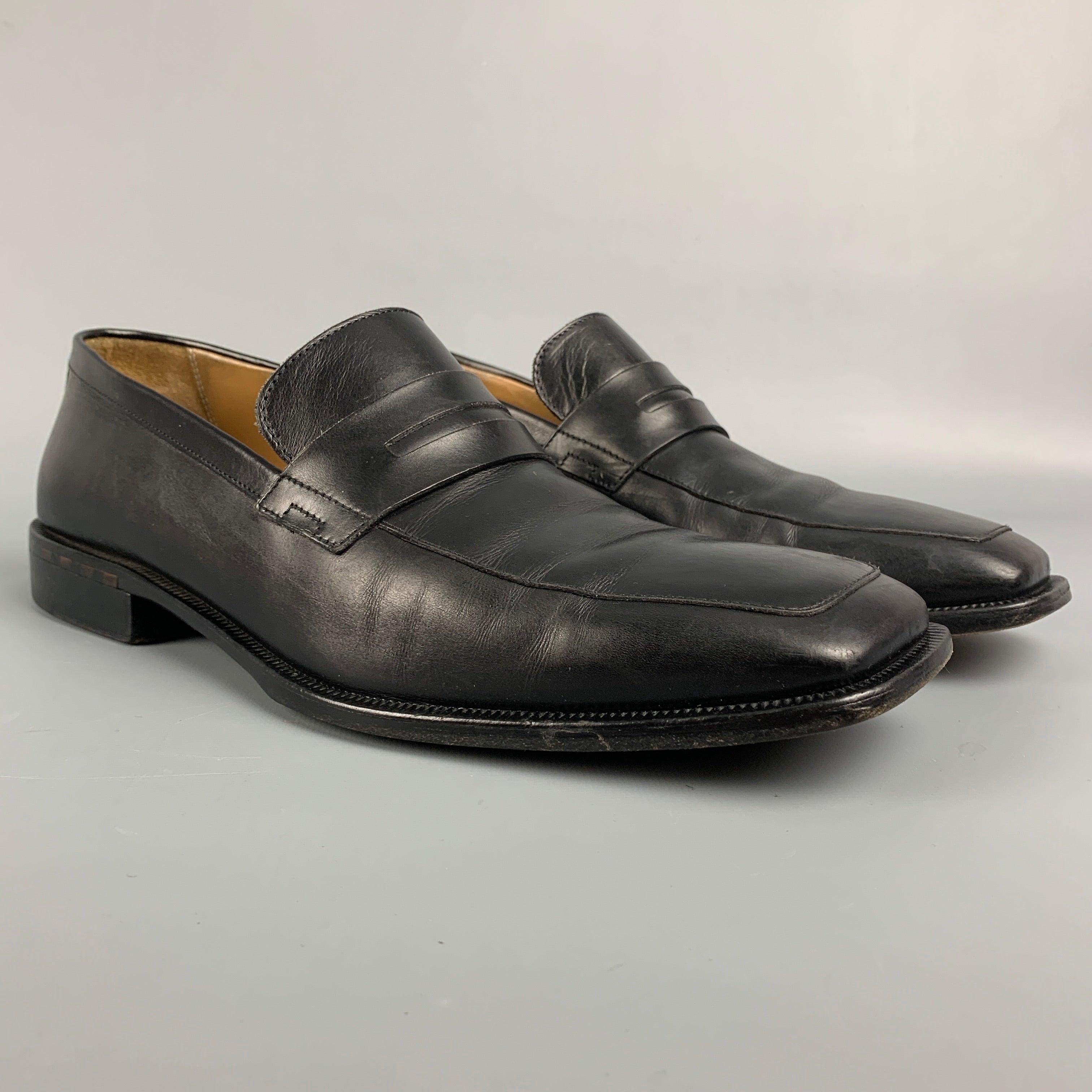 LOUIS VUITTON loafers comes in a black leather featuring a square toe and a monk strap. Made in Italy.Good
Pre-Owned Condition. 

Marked:   ST0013 / 9Outsole: 12 inches  x 4 inches 
  
  
 
Reference: 111936
Category: Loafers
More Details
   