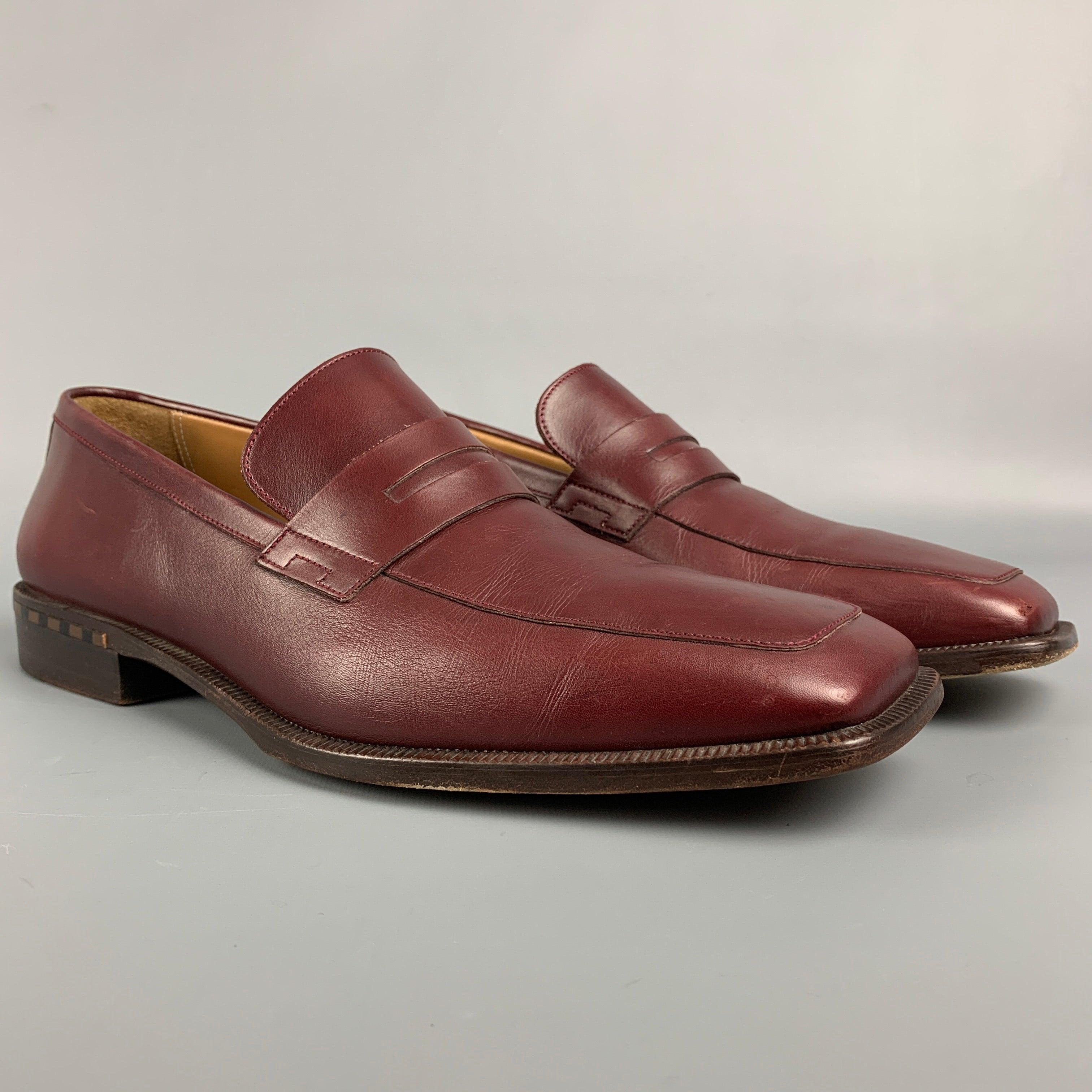LOUIS VUITTON loafers comes in a burgundy leather featuring a square toe and a monk strap. Made in Italy.Good
Pre-Owned Condition. 

Marked:   ST0013 / 9Outsole: 12 inches  x 4 inches 

  
  
 
Reference: 111935
Category: Loafers
More Details
   