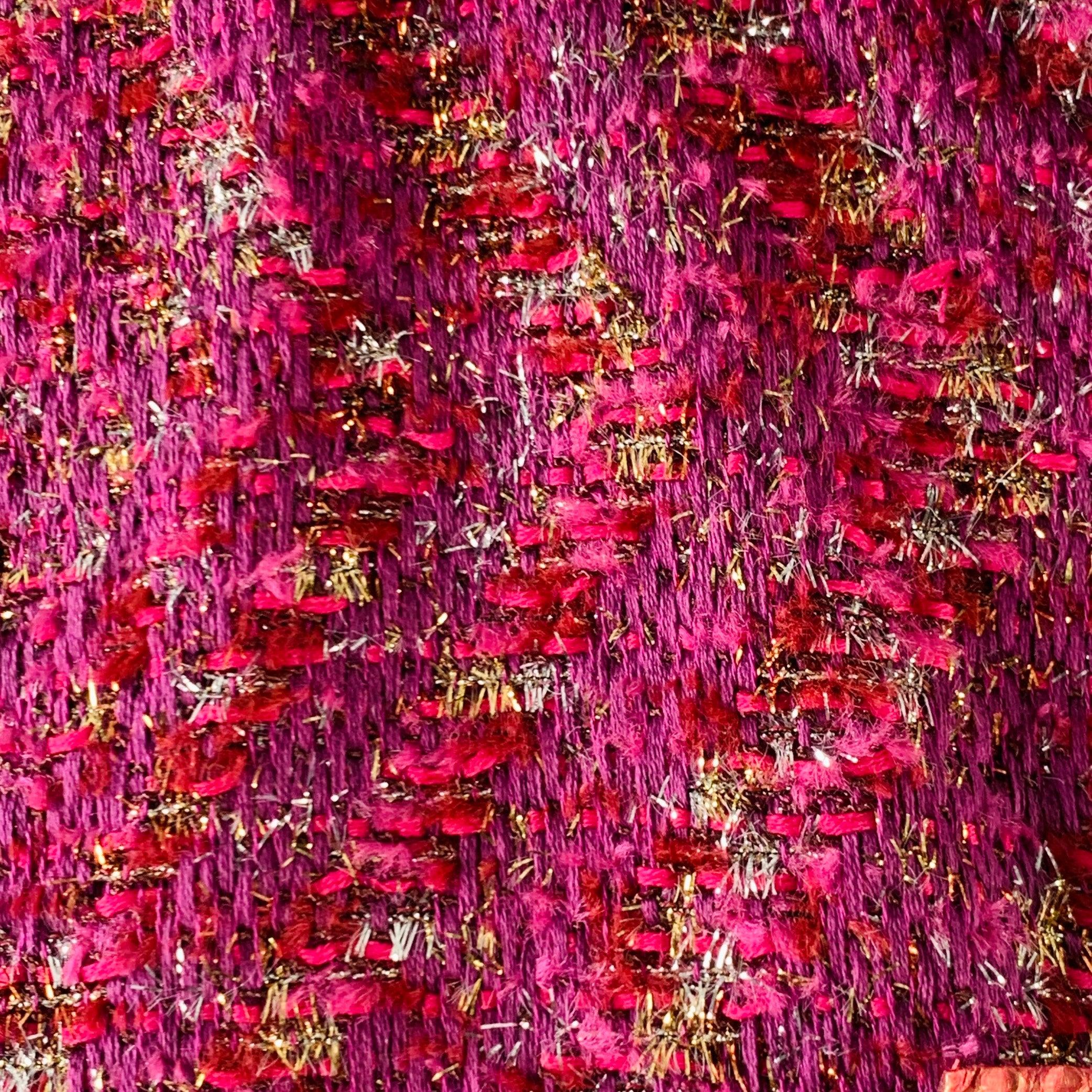 LOUIS VUITTON blazer
in a purple and fuchsia pink cotton blend fabric with metallic details featuring a Mandarin-style collar, snakeskin leather trim, and hidden gold tone metal hook & eye closure with three toggle closure details.Very Good
