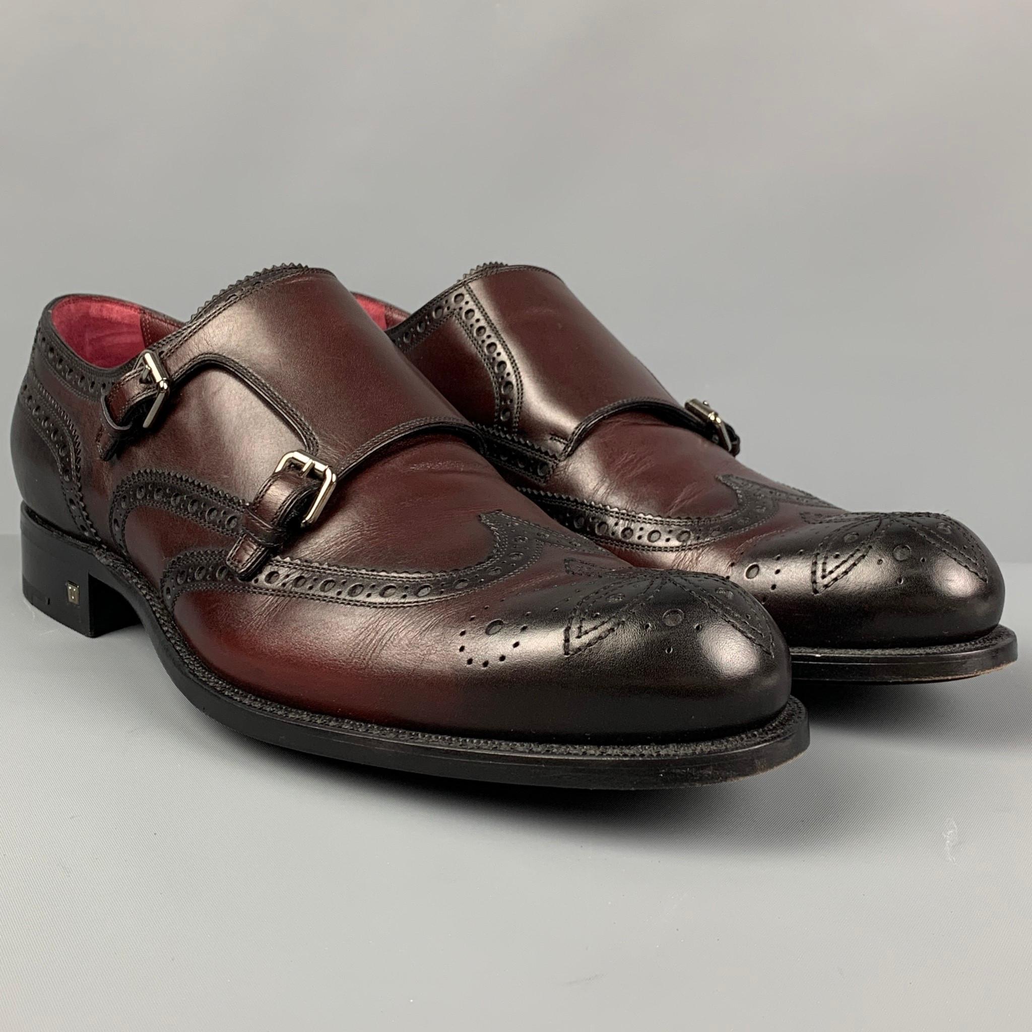LOUIS VUITTON loafers comes in a burgundy antique leather featuring a wingtip style and a double monk strap closure. Made in Italy. 

Very Good Pre-Owned Condition.
Marked: MT 0162 10

Outsole: 12.5 in. x 4 in. 